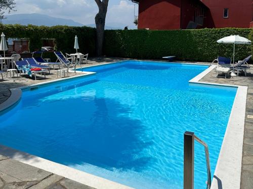Mirasole Apartment | Inviting Apartment with Pool and Oceanfront Views