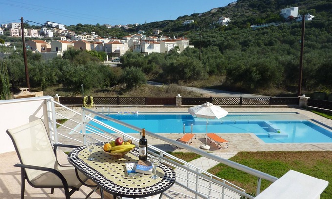 Almyrida Apartment | Inviting Apartment Steps from Beach with Shared Pool Access