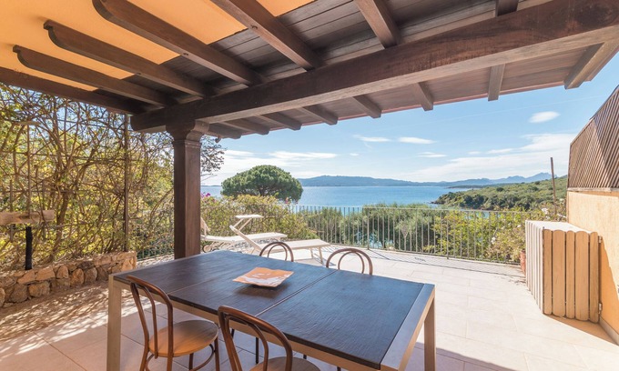 Capo d'Orso Apartment | Beachside Apartment 'Z2 20 Cala Capra' with Pool & Wi-Fi