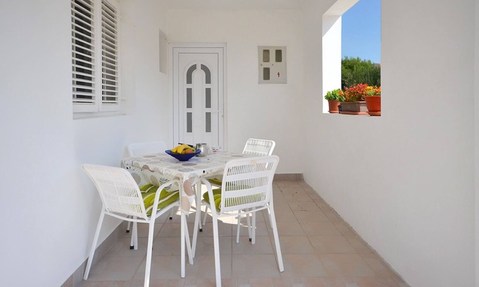 Tribunj Apartment | Discover Apartments Mila: Oceanfront Oasis with Pool