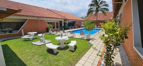 Ciudad Cariari Apartment | Highly Rated Apartotel Obelisco San José with Pool & Oceanfront