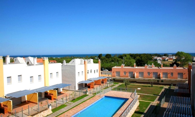 Creixell Apartment | Family-Friendly AP Costas - Via Augusta with Pool & Spa