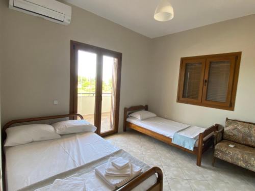 Ormos Panagias Apartment | Discover Aphrodites Gardens: Pet-Friendly Family Retreat