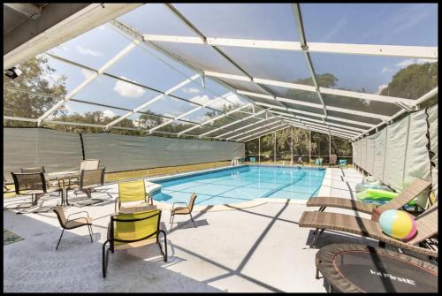 Apopka House | Relax at Apopka Heavenly Pool: Oceanfront & Pet Friendly