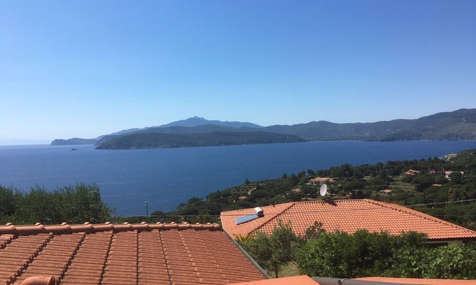 Capoliveri Apartment | Seaside Retreat with Gorgeous Views and Child-Friendly Amenities