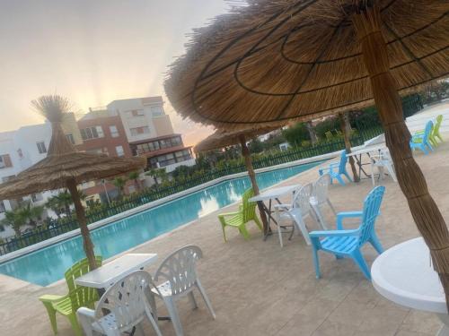 Hjar Ennhal Apartment | Beachside Escape at Appart Tanger Beach with Oceanfront Views