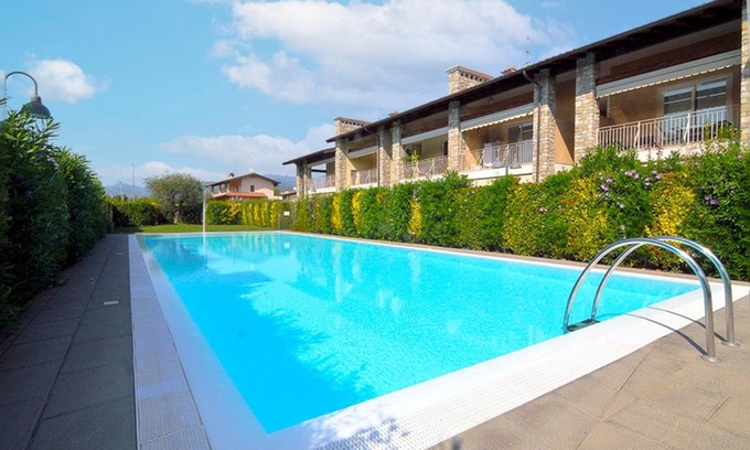 Raffa Apartment | Oceanfront Appartamento Benaco 108 with Pool & Great Views