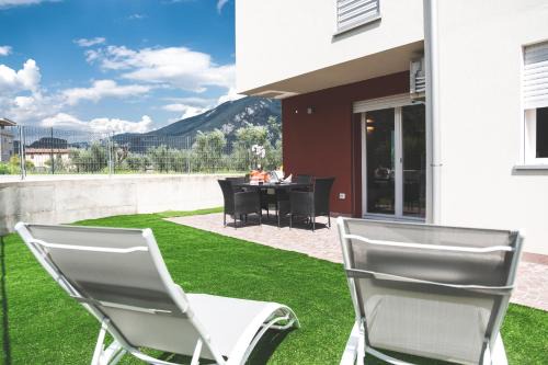 Riva del Garda Apartment | Inviting Campagnola Apartment with Private Garden & Pool