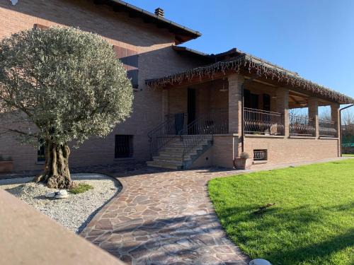 Sasso Marconi Apartment | Inviting Apartment with Garden, Hot Tub and Breakfast Included