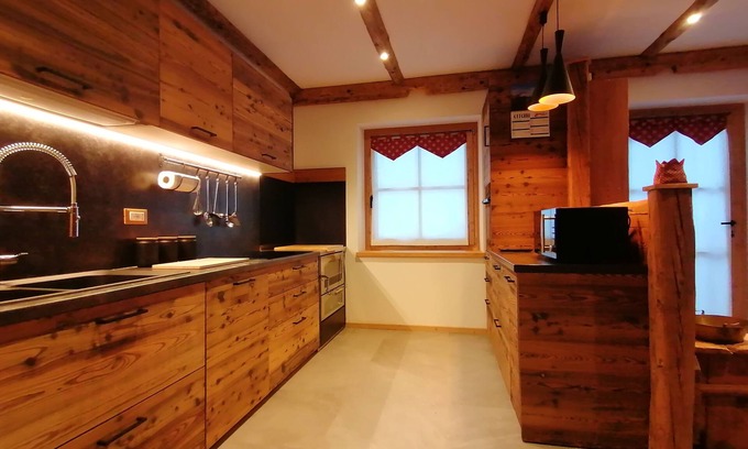 Vermiglio Apartment | Deluxe Mountain Apartment with Sauna and Ocean View