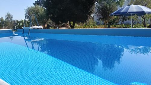 Pittuini Apartment | Ideal Oceanfront Apartment in Porto Cesareo with Pool