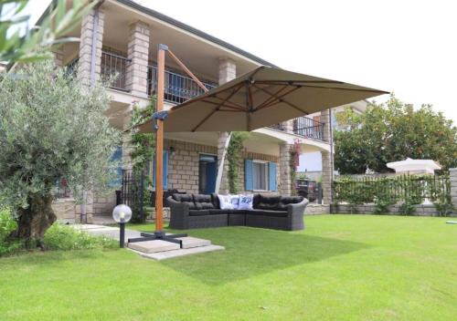 Badesi Villa | Seaside Paradise: Appartamento in Villa Matilde with Garden
