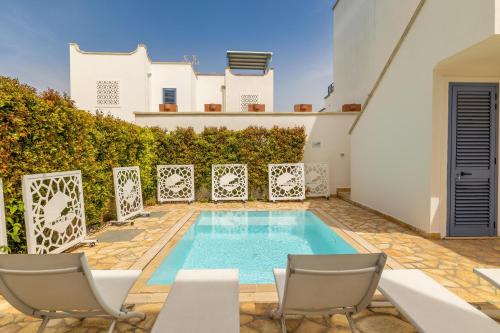 Boncore Villa | Inviting Appartamento Playa Mozza with Oceanfront Pool