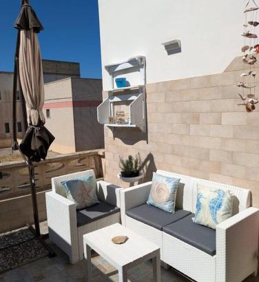 Torre Colimena Apartment | Welcoming Appartamento - Rosamarina: Child-Friendly Retreat