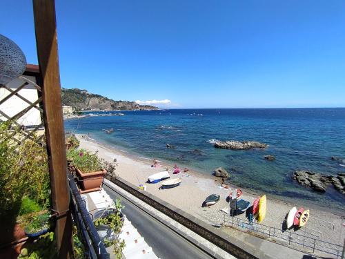 Giardini Naxos Apartment | Beachfront Escape at Appartamento Teocle - Rated 9.5/10