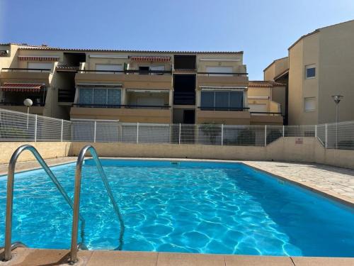 Marseillan Plage Apartment | Top-Rated Apartment with Pool & Parking Near Shops