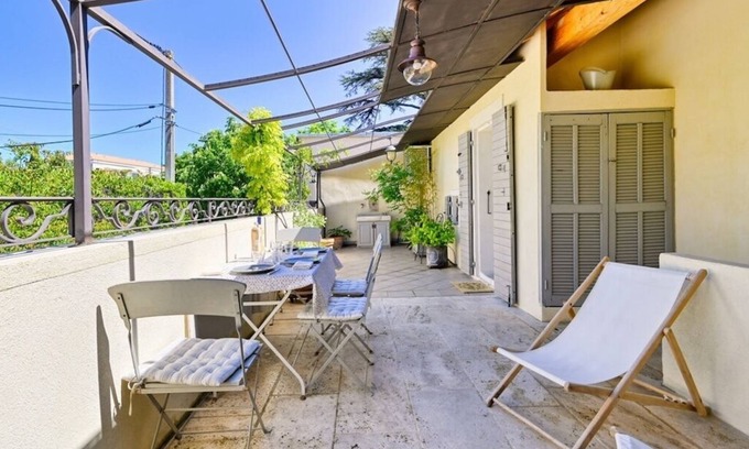Couronne Urbaine Apartment | Elegant City Apartment with Terrace and Pool Amenities
