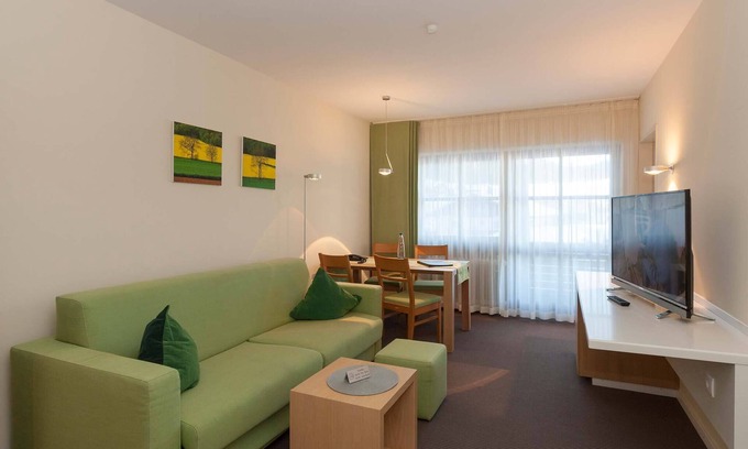 Resten Apartment | Inviting Apartment with Scenic Views and Family Amenities