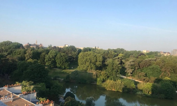 Parc-de-Montsouris Apartment | Inviting Parisian Apartment with Park View and Sunny Balcony