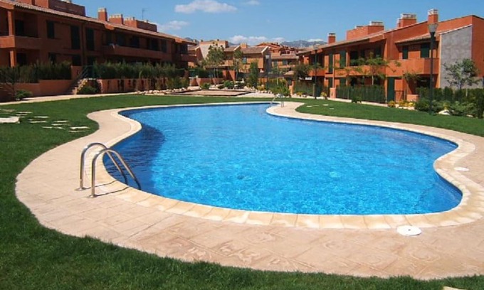 L Almadrava Apartment | Beautiful Oceanfront Apartment with Pool and Garden Oasis
