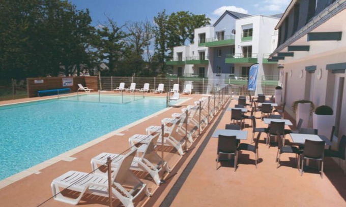 Plescop Condo | Spacious Apartment with Pool Access and Family Amenities