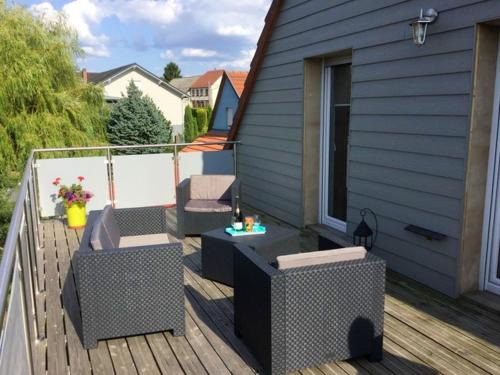 Lohr Apartment | Charming 3-Bedroom Apartment with City View and Garden