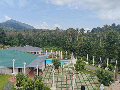 Irinjalakuda Bed & Breakfast | AppleLand City Athirapilly