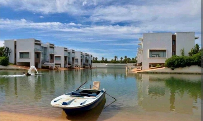 Cherrat Apartment | Oceanfront Residence at Eden Island: Pet-Friendly Retreat