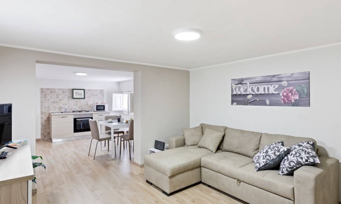 Borgo-Sanzio Apartment | Convenient Apartment Steps from Villa Bellini with Breakfast