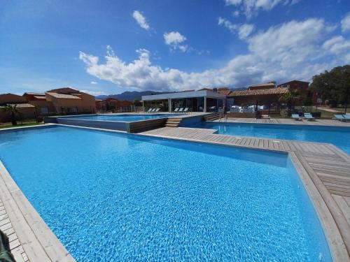 Lecci Apartment | Seaside Retreat: Apt 91, T2 in Lecci with Pools