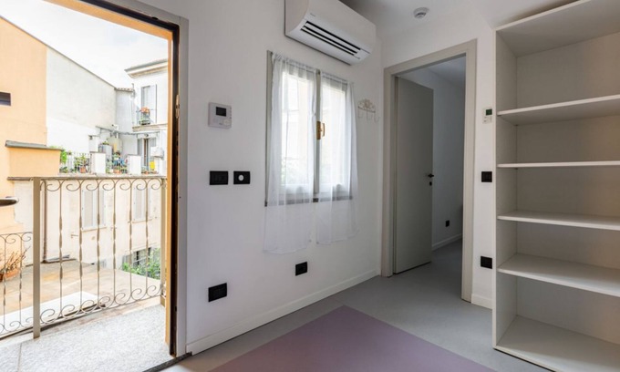 Magenta Apartment | Cozy Apartment with Inner Courtyard Views & Great Amenities