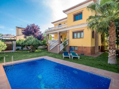 Dilar Apartment | Rustic Elegance in Dílar with Pool & Pet-Friendly Amenities