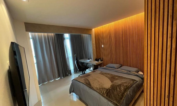 Meia Praia Apartment | Beachside Apartment with Ocean View & Family-Friendly Perks