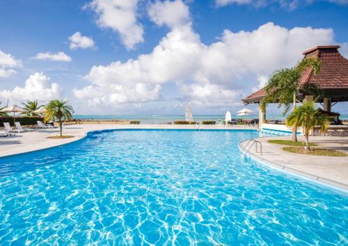 Garapan Hotel | Elegant Aqua Resort Club Saipan with Private Beach & Spa