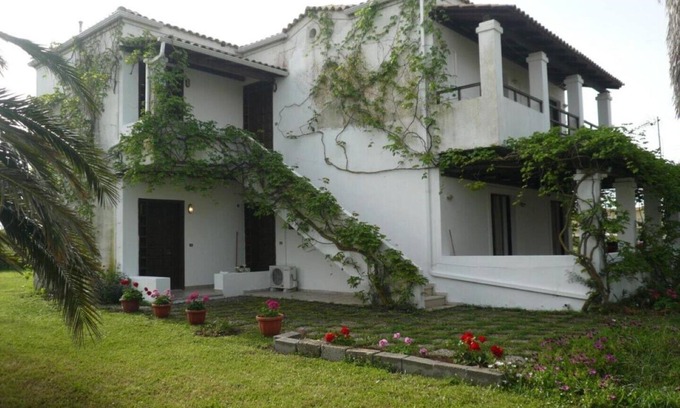 Ag. Georgios Apartment | Relaxing Aqua Splash Apartment with Balcony and Pool Access