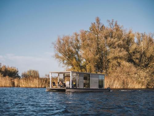 Werkendam Ski Chalet | Unique Stays at AquaHome - Experience Life on a Houseboat