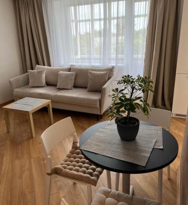 Siauliai Apartment | Experience Arčiau Dangaus: Pet-Friendly & Family Approved