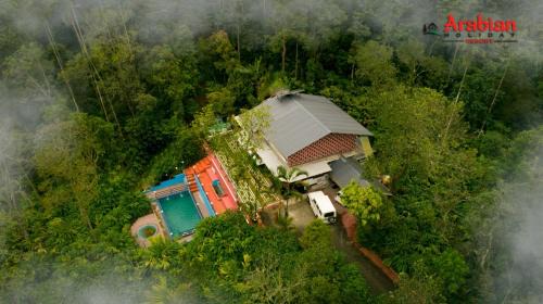 Thankamony part Apartment | Relax at Arabian Holiday Resort with Pool in Idukki