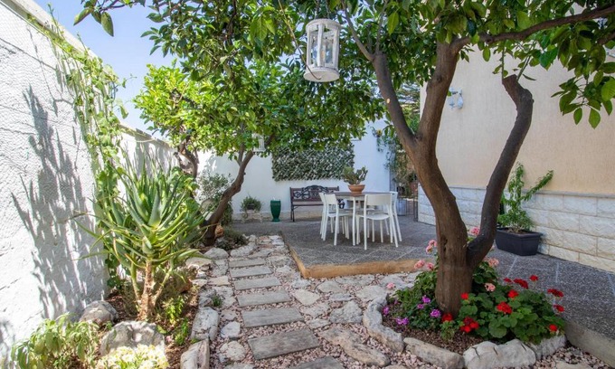 Montalbano Apartment | Elegant Araucaria Guest House: Family-Friendly Retreat
