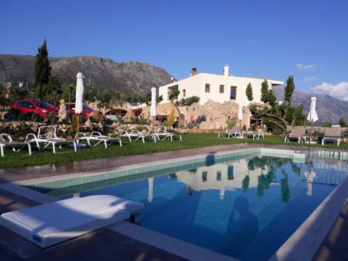 Amari House | Aravanes: Oceanfront Retreat with Pool & Top Guest Rating