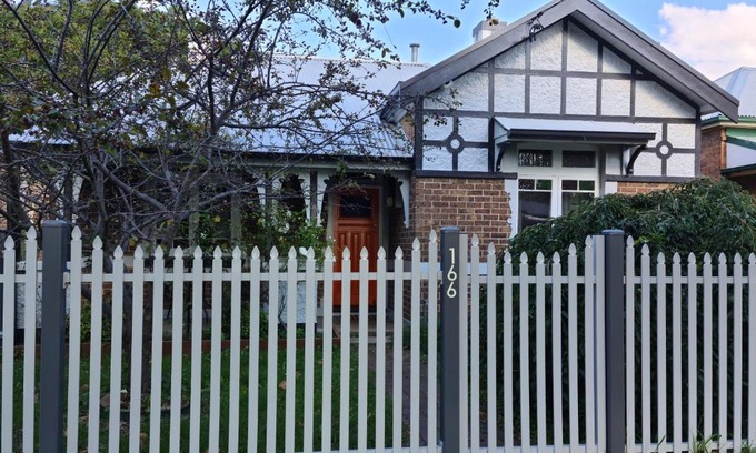 Orange House | Discover Arden on McLachlan: Pet-Friendly Retreat with Hot Tub