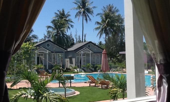 Ho Tram Resort | Relax at Areca Resort: Family-Friendly with Pool & Hot Tub