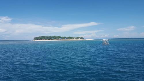 Narra Resort | Relax at Arena Island Resort with Ocean View and Private Beach