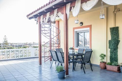Tymbaki Apartment | Ideal Family Retreat at Arena's Place - Rated 9/10