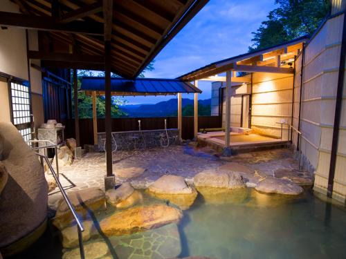 Kita Ward Hotel | Relax at Arima Onsen Motoyu Ryuusenkaku with Ocean Views