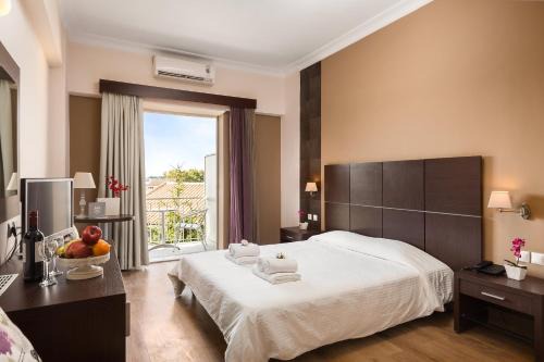 Corfu Town Hotel | Pet-Friendly Retreat at Arion Hotel with Poolside Dining