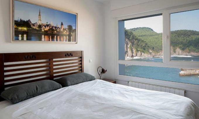 Arminza Apartment | Oceanfront Escape at Armintza Port by Aston Rentals