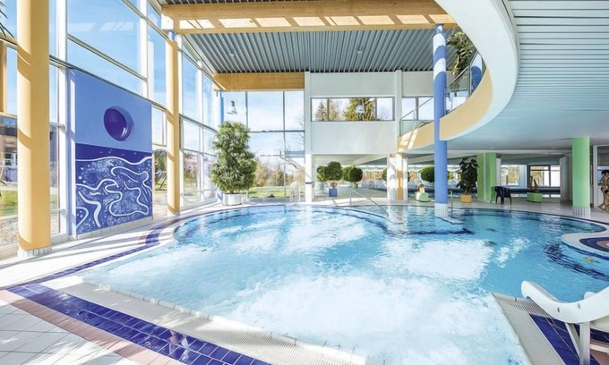 Stockach House | Relax at Arnika by Interhome: Pool, Spa & Lake Views