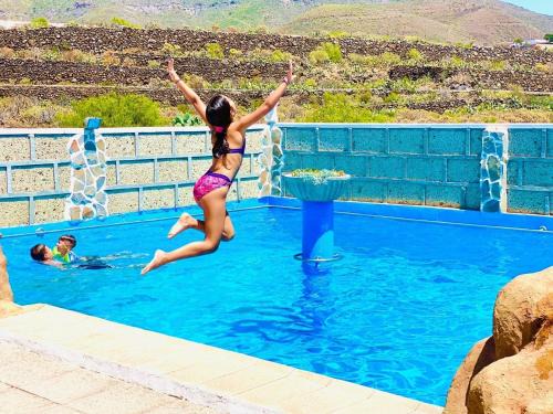 Buzanada Apartment | Relaxing Arrebol Suite with Jacuzzi and Pool Oasis