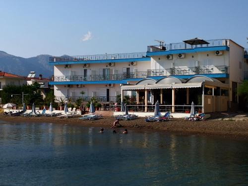 Amarinthos Hotel | Discover Artemis Hotel: Beachfront Bliss with Ocean Views